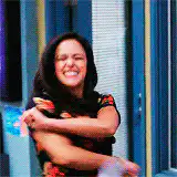 Pam Beesly laughing and spinning