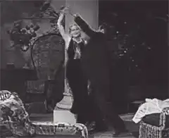 Man and woman dancing in black and white