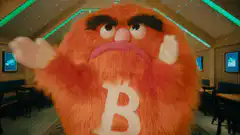 Angry Bitcoin mascot in a lounge