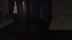 Golden coin swinging on a chain