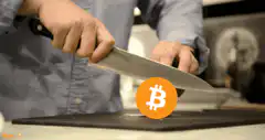 Chef chopping a Bitcoin