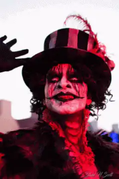 Red and black clown with top hat