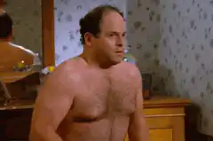 Jerry Seinfeld shirtless in bathroom