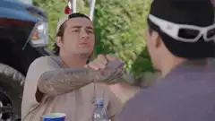 Tattooed guy does a smooth hand gesture