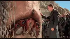 Colonel Starbucker touches the alien