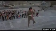 Rocky running up the museum steps