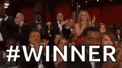 Audience clapping with #WINNER text