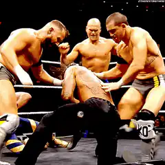 WWE wrestlers beat down opponent with steel chair