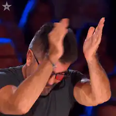 Simon Cowell clapping