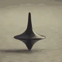 Spinning black top