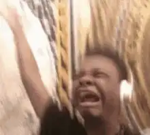 Kid screaming with headphones