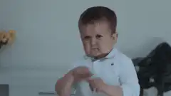 Toddler doing the dab dance move