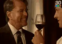 Man toasting with wine glass
