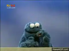 Cookie Monster eating a cookie