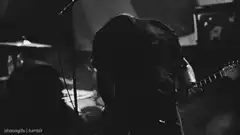 guitarist headbanging on stage