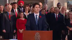 Justin Trudeau shrugs at podium