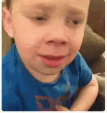 Kid looking suspicious and side-eyeing