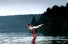 Man lifts woman in lake then drops her