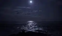Moonlight reflecting on ocean waves