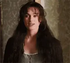 Keira Knightley shy smile and look down