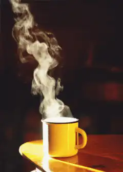 yellow mug with rising steam