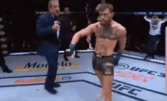 Conor McGregor celebrates with a Bitcoin Jade