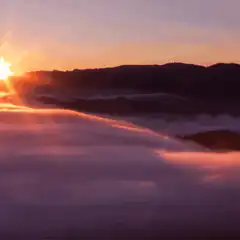 Sunrise over mountains and clouds