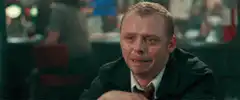 Simon Pegg crying and facepalming