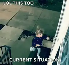 Toddler struggling to open door