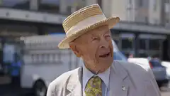 Old man laughing in hat