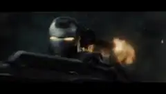 War Machine firing his gatling gun
