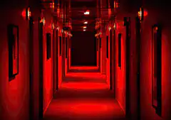 Red hallway with flickering lights