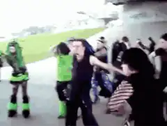 Group of people dancing outdoors