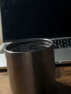 steam rising from coffee cup
