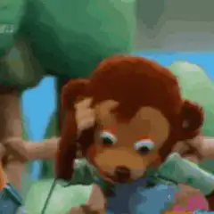 Monkey puppet scratching head confused