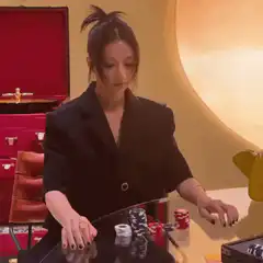 Woman playing poker with chips