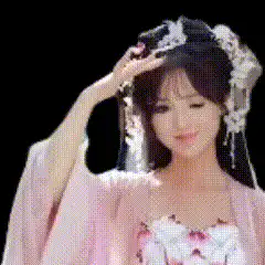 woman in pink hanfu smiling
