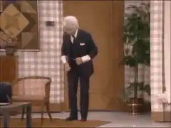 Mr. Burns adjusting his suit