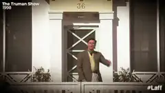 Jim Carrey as Truman Burbank waving