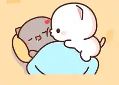 kitten kisses sleeping cat