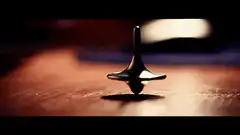 Spinning top wobbling