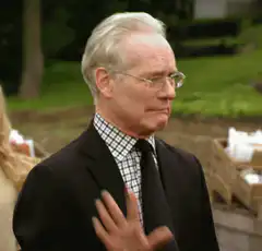 Ed Harris raising hand
