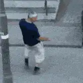 Old man dancing then falls over