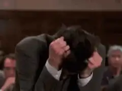 Jim Carrey screaming then smirking