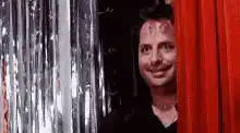 Mark Hamill peeks from behind curtain