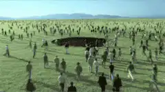Crowd of people walking into a pit