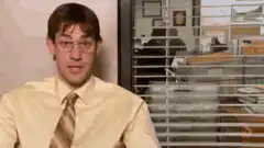 Jim Halpert checks watch