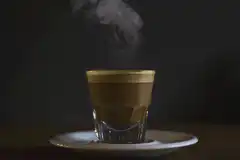 Steaming espresso in a glass