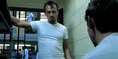 Prison inmate pulls out a white cloth
