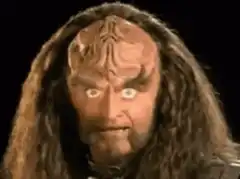 Klingon man smirking